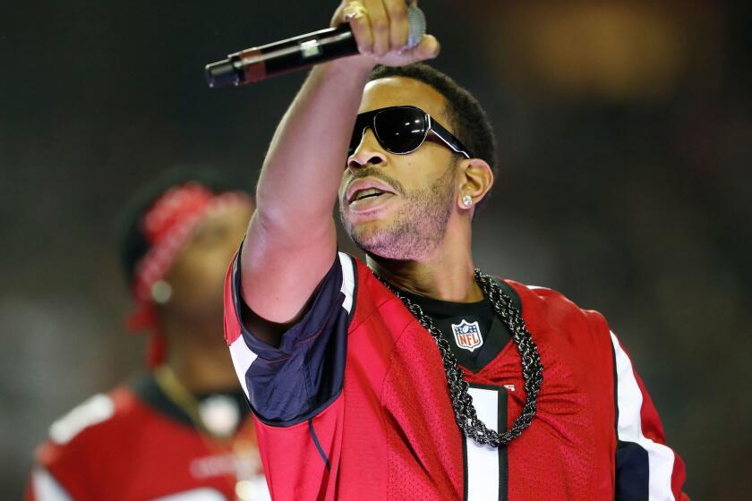 Ludacris performs at halftime during a NFL game earlier this month between the Atlanta Falcons and the Seattle Seahawks.