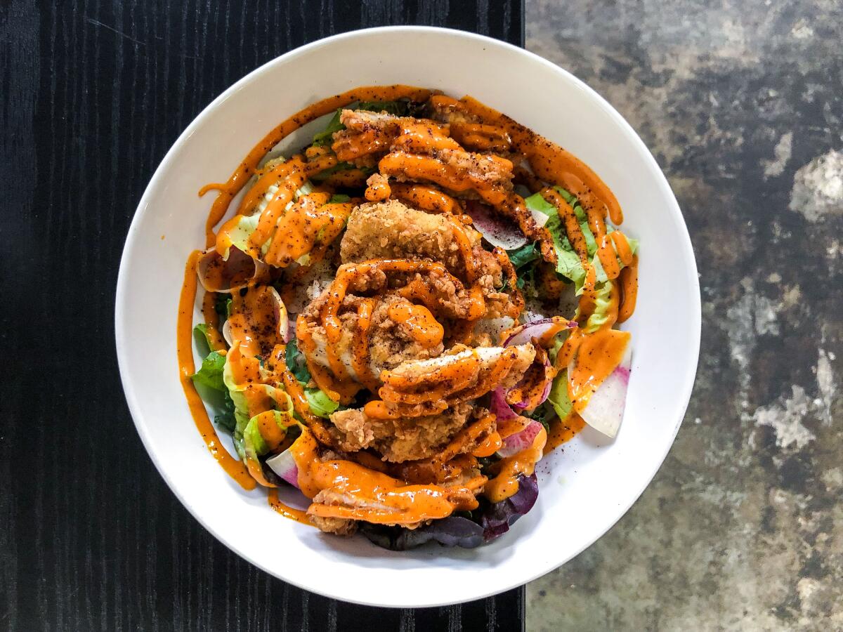 Baroo Canteen's fried chicken rice bowl, garnished with gochujang kewpie mayo.