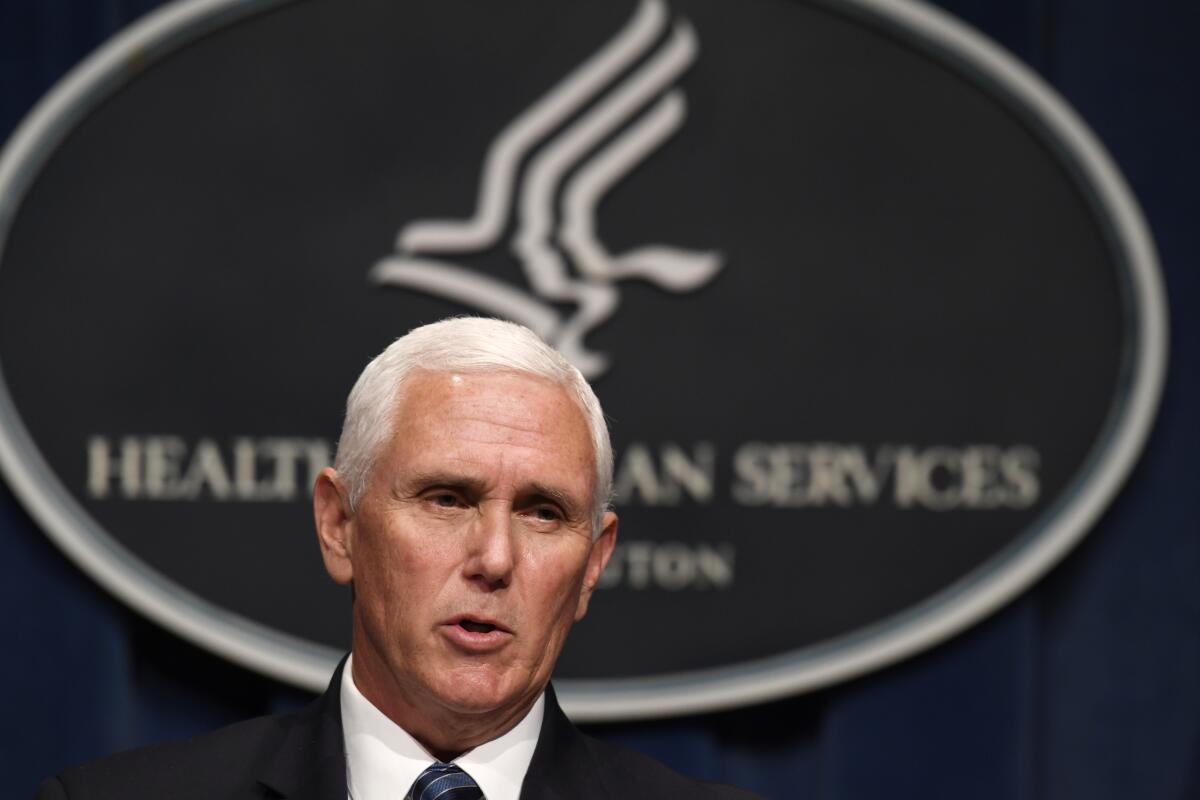 Vice President Mike Pence speaks at a coronavirus task force news conference at the Health and Human Services Department.