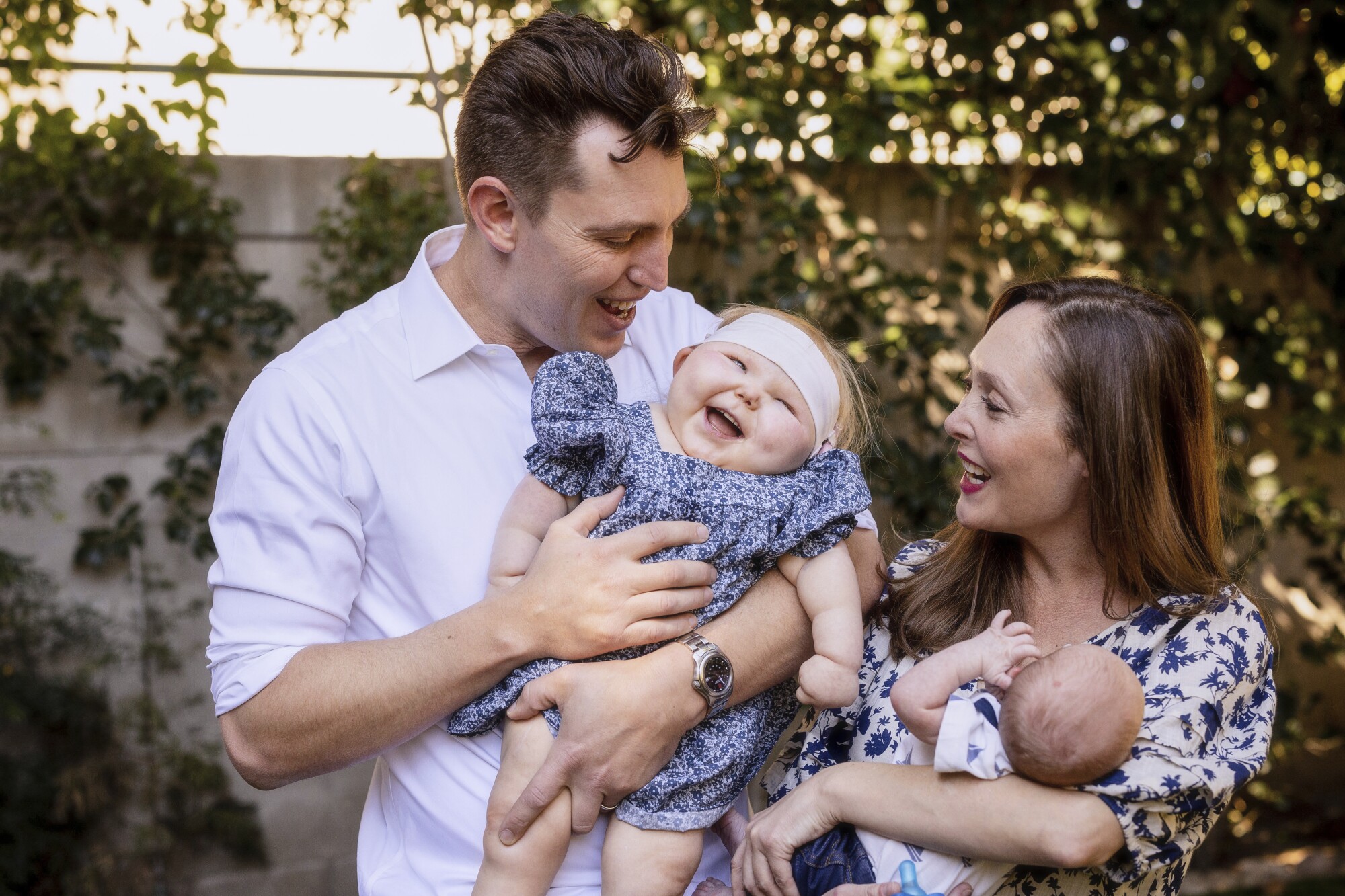 Lindzi Scharf with her husband, Michael Buckner, and their two children, Evan and Reid.