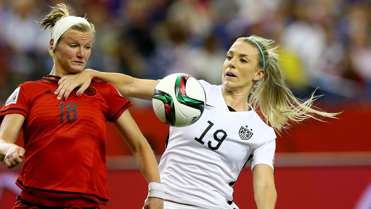 U.S. defender Julie Johnston fouls Germany's Alexandra Popp during the second half of a 2-0 victory in the women's World Cup semifinals on Tuesday.