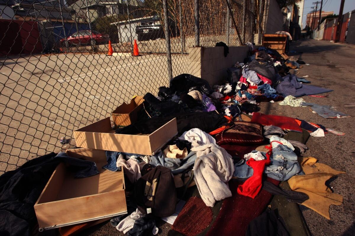 Clothes are discarded in an alley in the Pico-Union neighborhood, part of a swath of Los Angeles that will be designated a "Promise Zone."