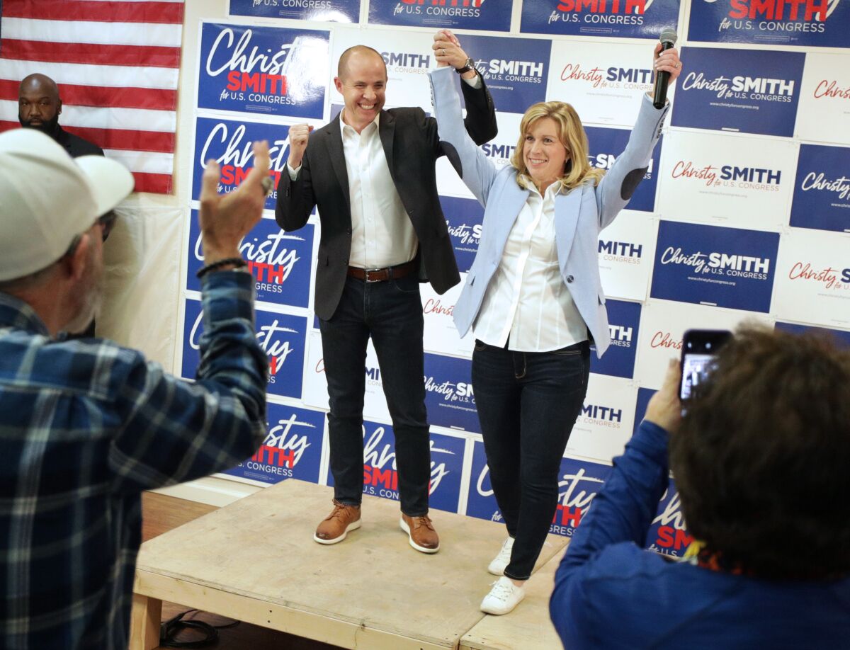 California Democratic Party Chair Rusty Hicks introduces then-state Assemblymember Christy Smith in March 2020.