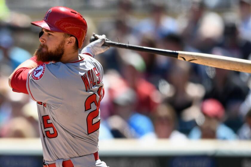 MINNEAPOLIS, MN - MAY 15: Jared Walsh #25 of the Los Angeles Angels hits a single against the Minnesota Twins in his major league debut during the sixth inning of the game on May 15, 2019 at Target Field in Minneapolis, Minnesota. The Twins defeated the Angels 8-7. (Photo by Hannah Foslien/Getty Images) ** OUTS - ELSENT, FPG, CM - OUTS * NM, PH, VA if sourced by CT, LA or MoD **