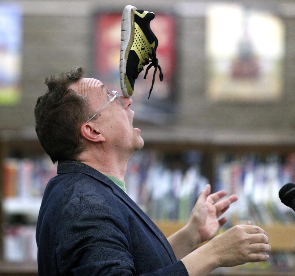 Photo Gallery: Comic juggler Michael Rayner performs for children at La Canada Library