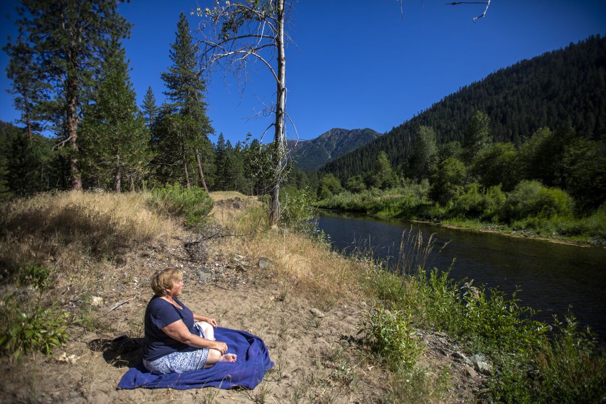 A woman meditating in nature