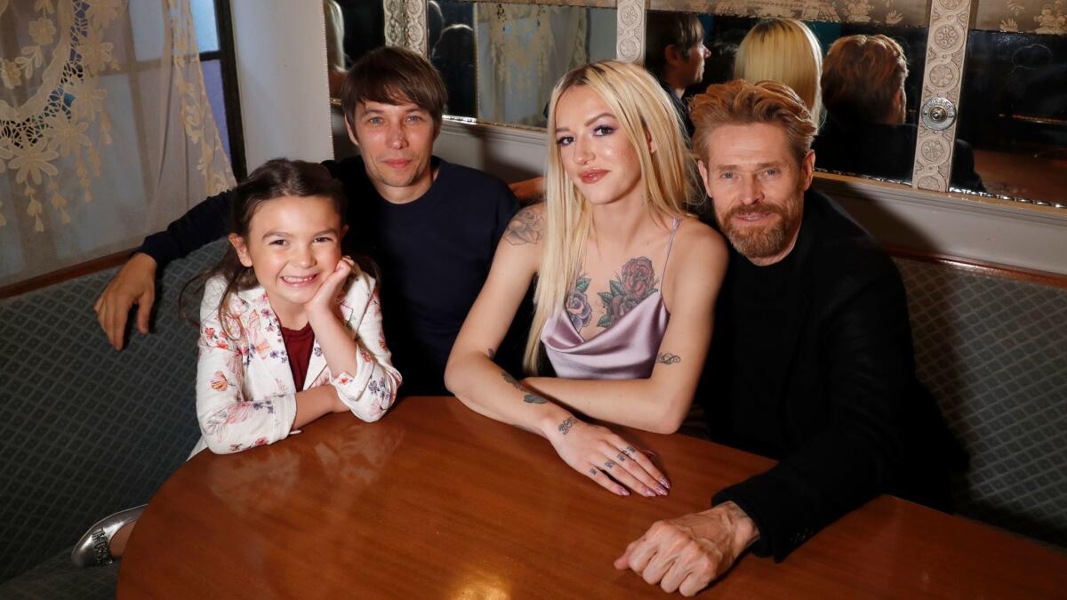 Director Sean Baker, second from left, and his "The Florida Project" stars, Willem Dafoe, right, Brooklynn Prince, left, and Bria Vinaite, at Chateau Marmont in Hollywood.