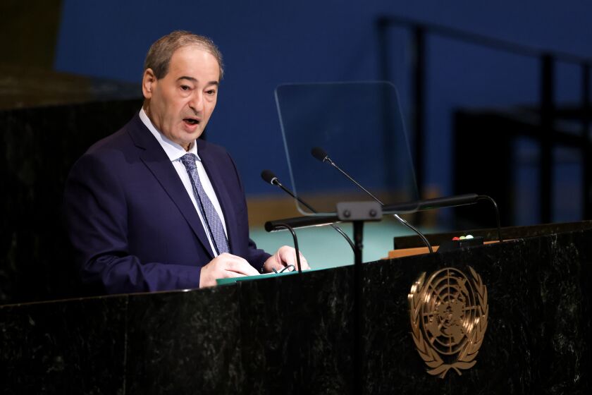 Minister for Foreign Affairs of Syria Fayssal Mekdad addresses the 77th session of the United Nations General Assembly, Monday, Sept. 26, 2022, at the U.N. headquarters. (AP Photo/Julia Nikhinson)