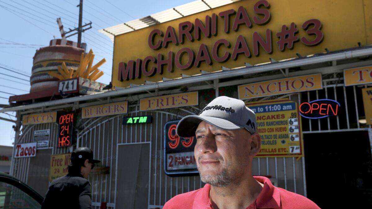 Richard Raya, 45, is a part-owner of Carnitas Michoacan, a 24-hour restaurant in Boyle Heights, that is closing after 30 years to make way for a Panda Express, which serves Chinese fast food.