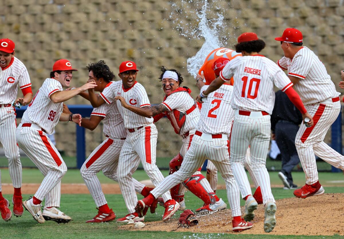 Corona players celebrate winning Boras Classic in San Diego.