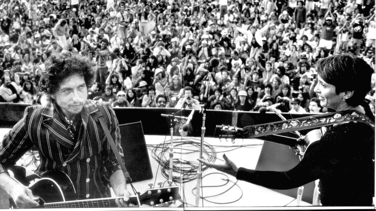 Bob Dylan and Joan Baez at the Rose Bowl in 1982.