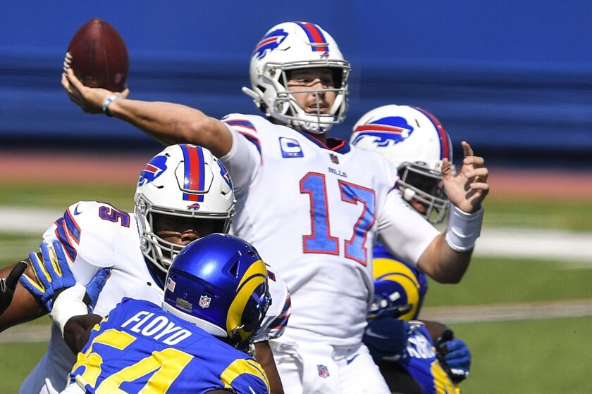 Buffalo Bills quarterback Josh Allen (17) throws a pass during the first half of an NFL football game.