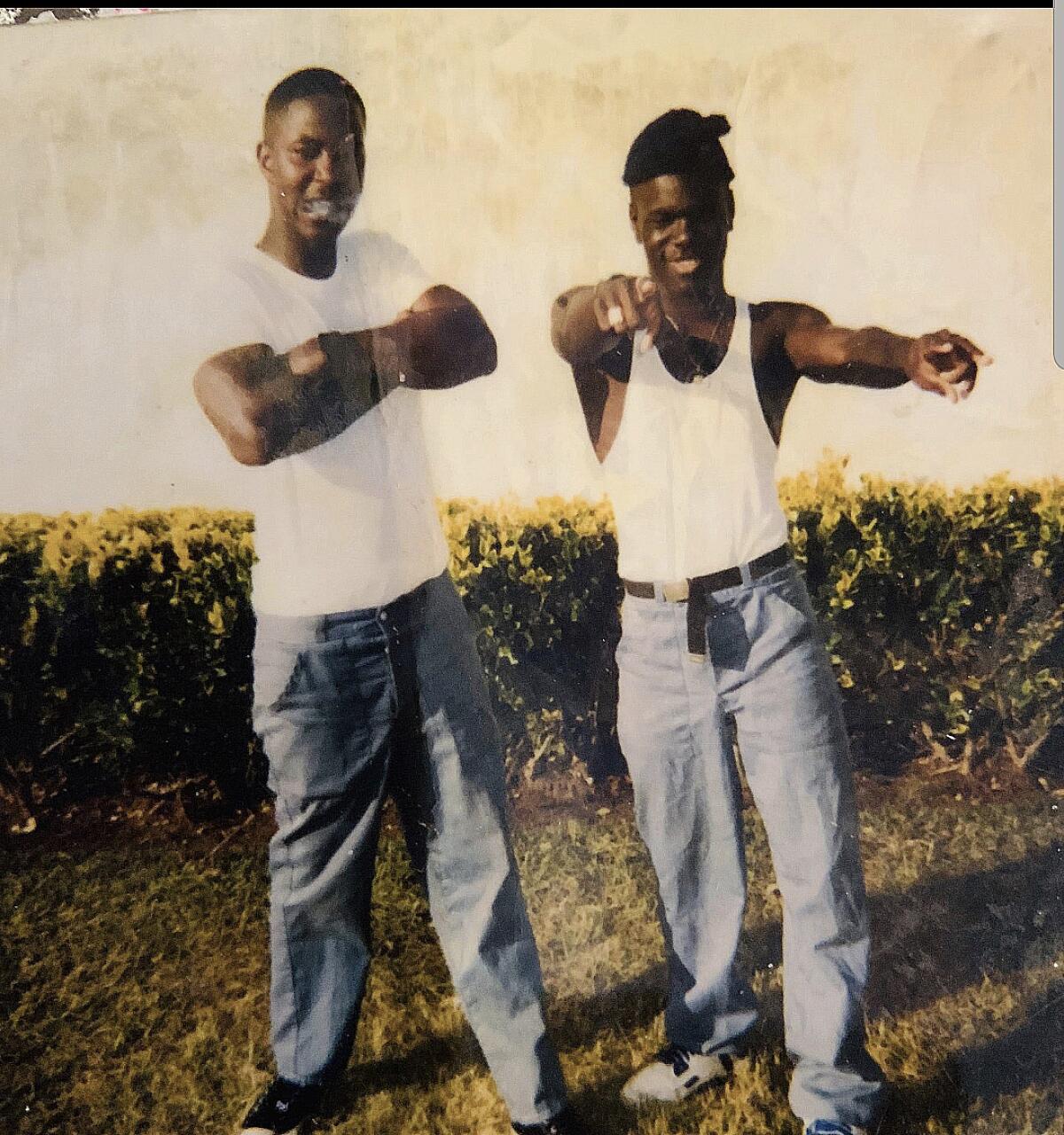 Ian Manuel (right) and another young man at Apalachee Correctional Institution, 1991. 