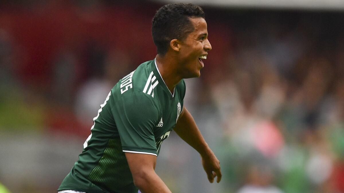 Mexico's Giovani Dos Santos celebrates after scoring against Scotland on June 2 in Mexico City.