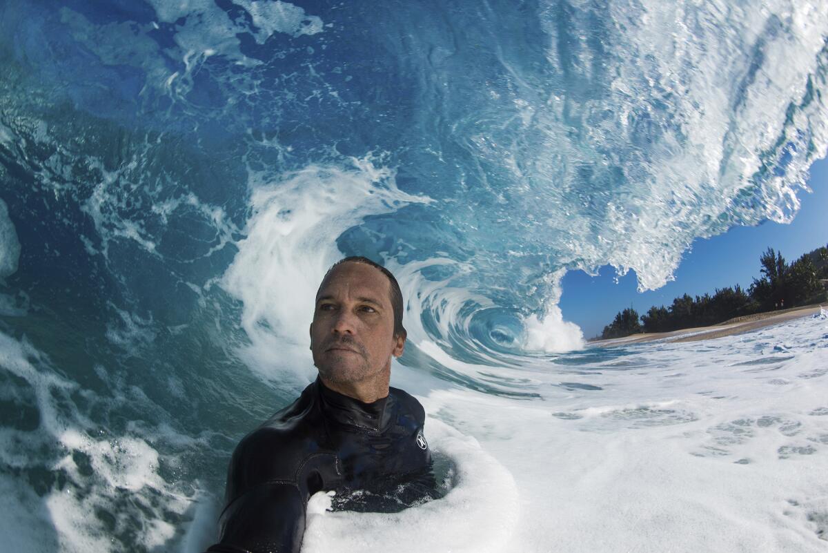 Clark Little takes a selfie as he photographs waves on the North Shore of Oahu near Haleiwa, Hawaii. (Clark Little via AP)