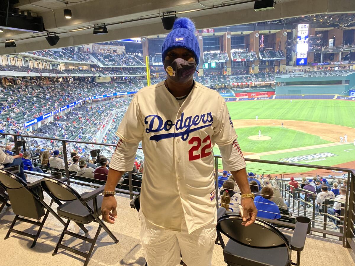 Former Dodgers scout Calvin Jones wears a Clayton Kershaw jersey while attending Game 4 of the NLCS.