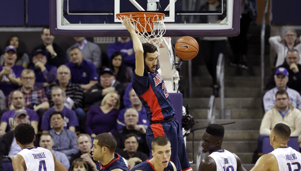 Arizona's Mark Tollefsen dunks against Washington during the first half of a Pac-12 Conference game on Feb. 6.