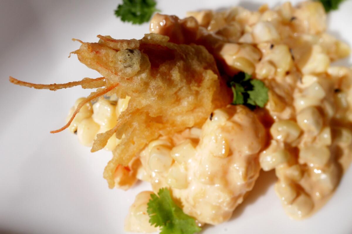 Chef John Sedlar's shrimp tempura with Peruvian aJi amarillo and maize.