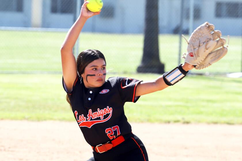 Los Amigos Sophia Gutierrez (27) pitches during Los Amigos High School girls' softball team against A.B. Miller High School girls' softball team in the second round of the CIF Southern Division 7 softball playoff game at Los Amigos High School in Fountain Valley on Tuesday, May 7, 2024. (Photo by James Carbone)