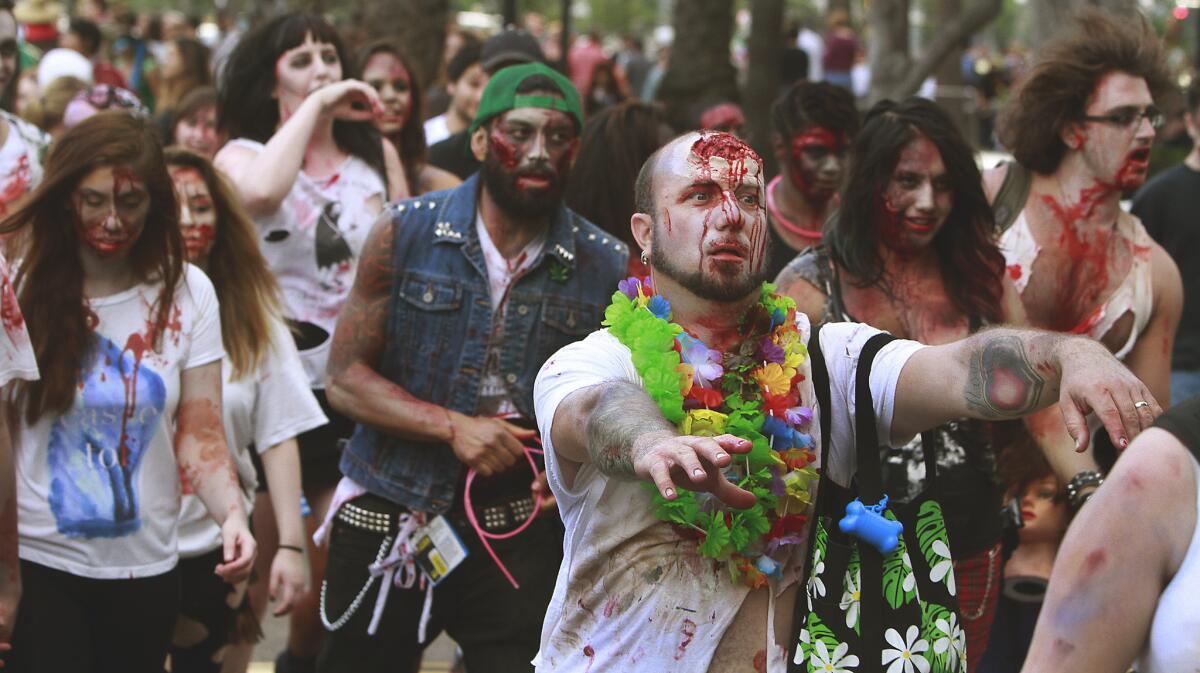 A driver faces a felony charge for hitting a pedestrian during the "zombie walk" at the Comic-Con convention in San Diego in 2014.