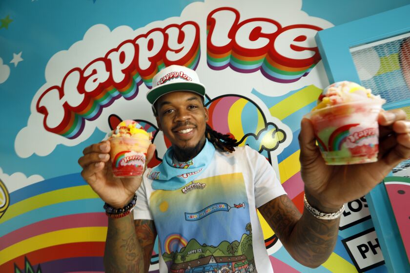 LOS ANGELES, CA-JUNE 20, 2020-Originally from Philadelphia, Lemeri Mitchell is owner of Happy Ice, a new water ice shop on Melrose Avenue. After starting his business in food trucks, Mitchell has opened his first brick and mortar shop on Melrose Ave. on June 20, 2020.. (Carolyn Cole/Los Angeles Times)