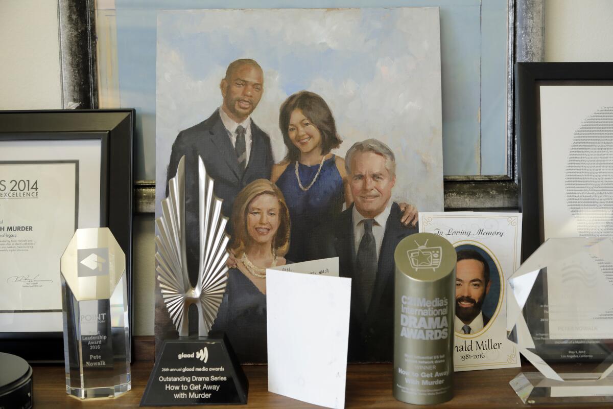 Pete Nowalk is the creator and showrunner of ABC's "How to Get Away With Murder." Awards and a portrait from Season 2 are displayed on his bookshelf. 