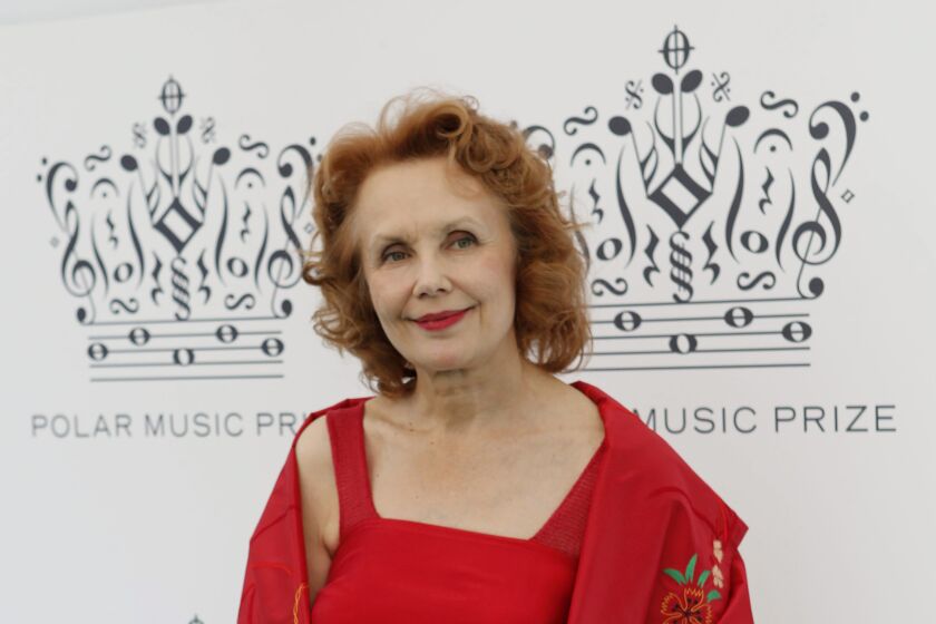 FILE - Composer Kaija Saariaho, of Finland, arrives for the Polar Music Prize ceremony, where she is to be named Polar Music Prize laureate Composer for 2013, at the Stockholm concert hall, in Stockholm, Sweden, on Aug. 27, 2013. Saariaho, who wrote acclaimed works that made her the among the most prominent composers of the 21st century, died Friday, June 2, 2023, at her apartment in Paris, her family said in a statement posted on her Facebook page. She was 70. Saariaho had been diagnosed in February 2021 with glioblastoma, an aggressive and incurable brain tumor. (Christine Olsson/TT News Agency via AP, File)