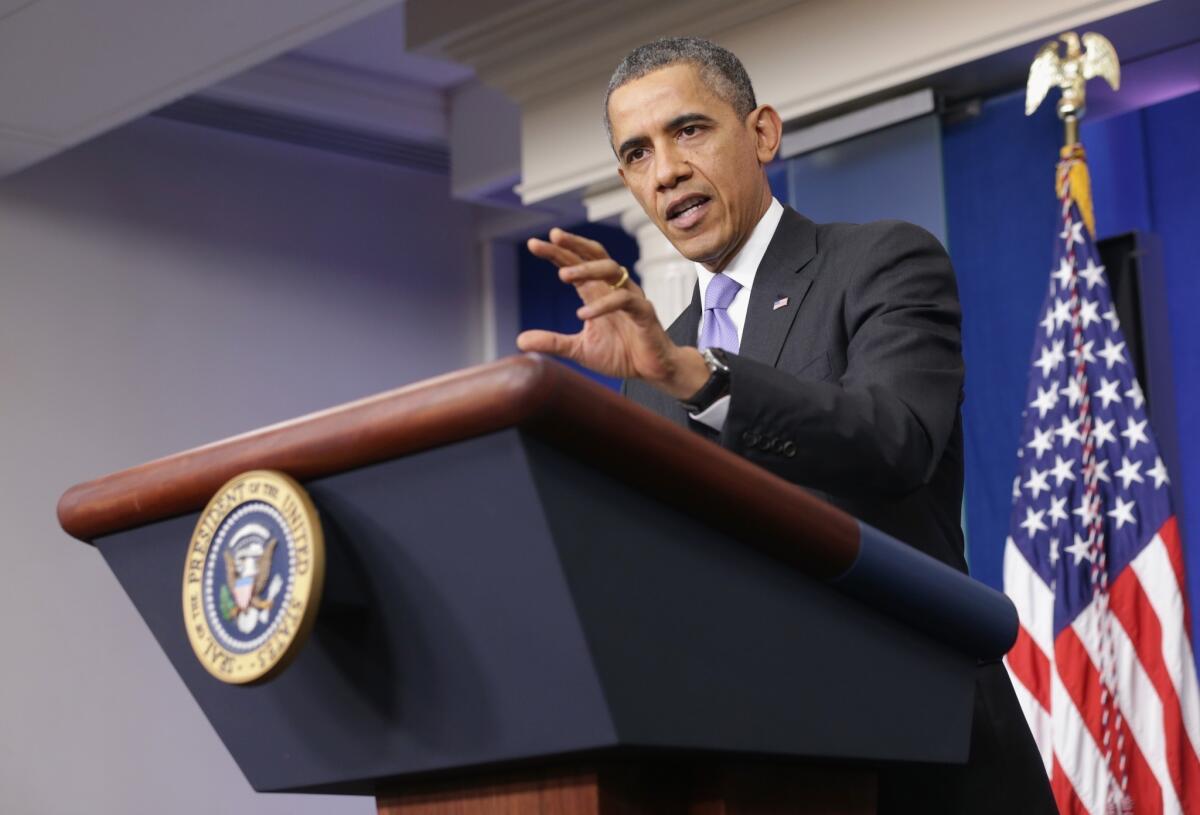 President Obama holds a news conference at the White House on Friday.