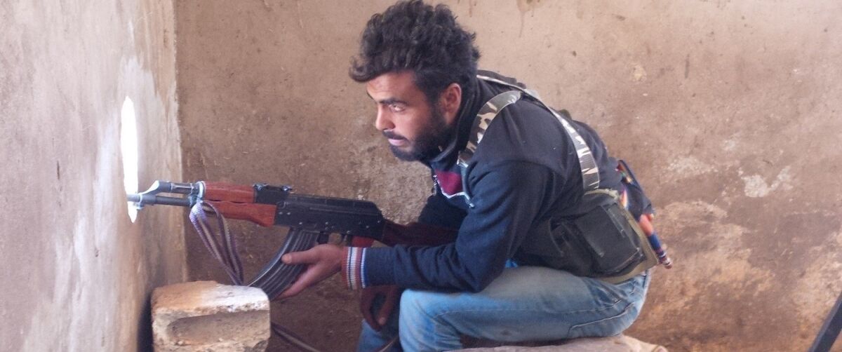 An Islamic Front rebel fighter in the northern Syrian town of Akhtarin in July.