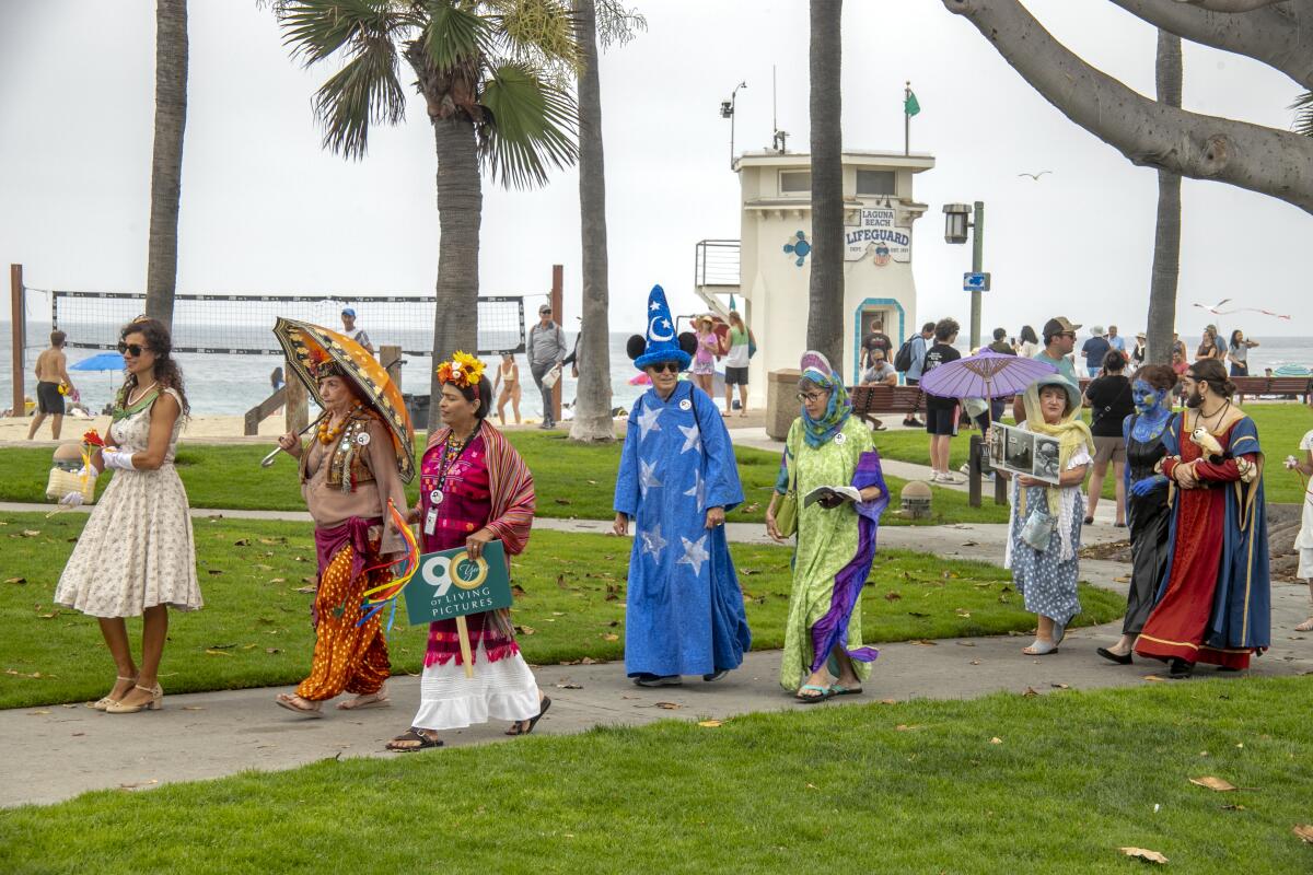 The parade passes Laguna Beach's iconic lifeguard tower.