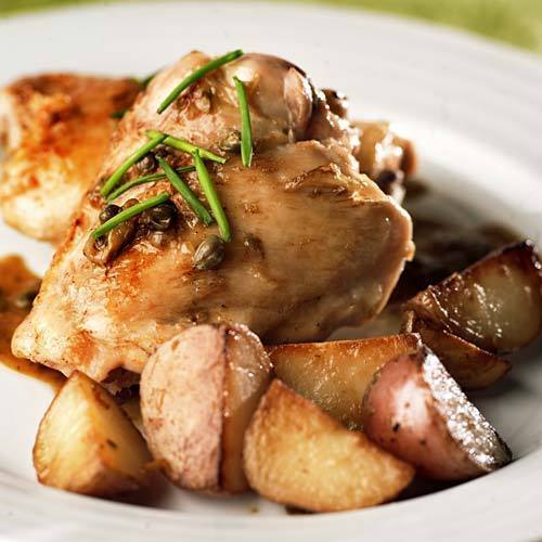 It's dinner in a skillet: Pan-braised chicken and new potatoes, flavored with tart capers and shallot and brightened with hints of sherry vinegar and lemon. And the whole meal comes together in less than an hour.
