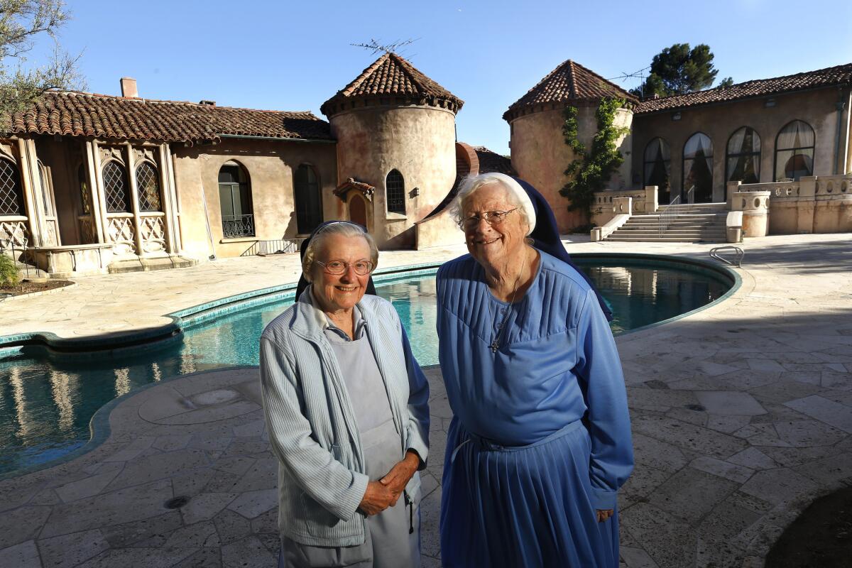 Sister Catherine Rose, 86, left, and Sister Rita Callanan, 77, are photographed at the Sisters of the Immaculate Heart of Mary Retreat House in Los Feliz in June.