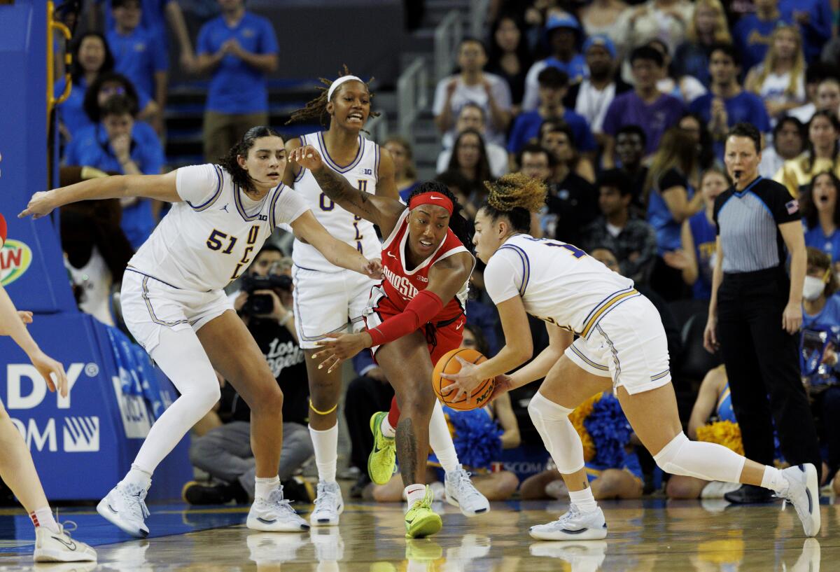 No. 1 UCLA ladies fend off pesky No. 8 Ohio State to stay unbeaten 1 UCLA guard Kiki Rice grabs the ball from Ohio State forward Cotie McMahon to start a fast break in the second half.