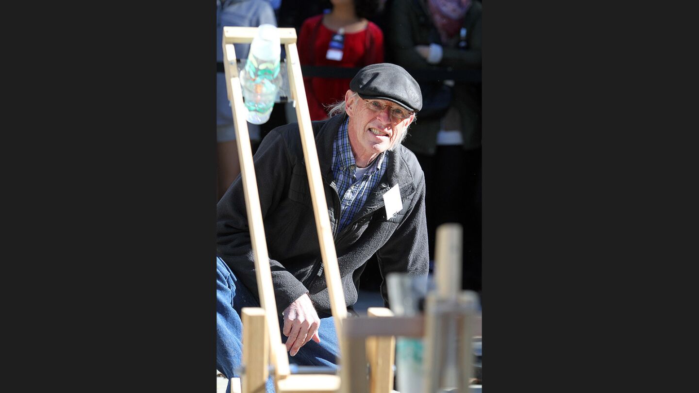 Alan DeVault, of Pasadena, watches his catapult start to move a cup of water to be dropped into a collection cup at JPL's annual Invention Challenge on Friday, December 2, 2016. 28 teams, including a team from Tanzania, but mostly of local Southern California schools, competed. The challenge was to transfer a specific amount of water over a distance to a collection cup on the other side. Methods included catapults, conveyor belts, a lot of duct tape, and pvc.