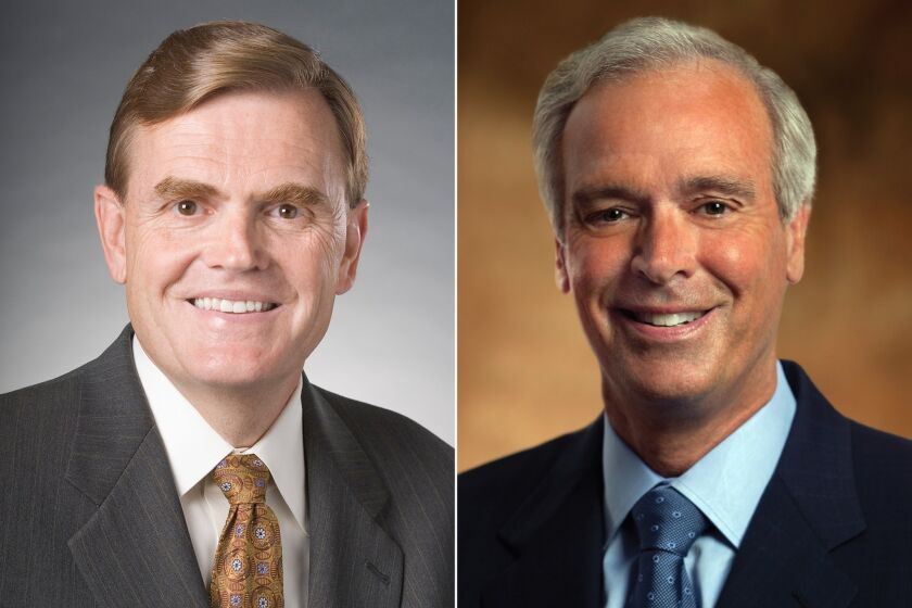 Chief Operations Officer David Abney, left, was promoted to chief executive of UPS Inc. He succeeds Scott Davis, right.