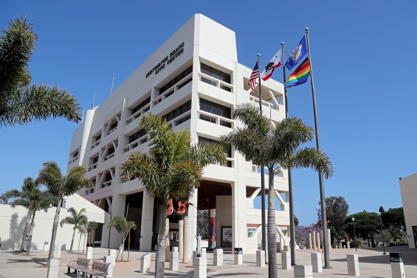 The city of Huntington Beach raised the LGBTQ Pride flag at City Hall for the first time on Saturday. 