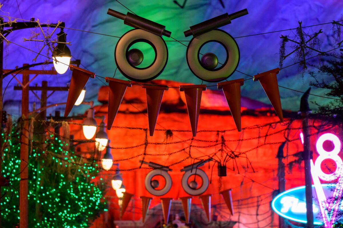 Cars Land at Disney California Adventure gets a purple, orange and green light makeover for Halloween.