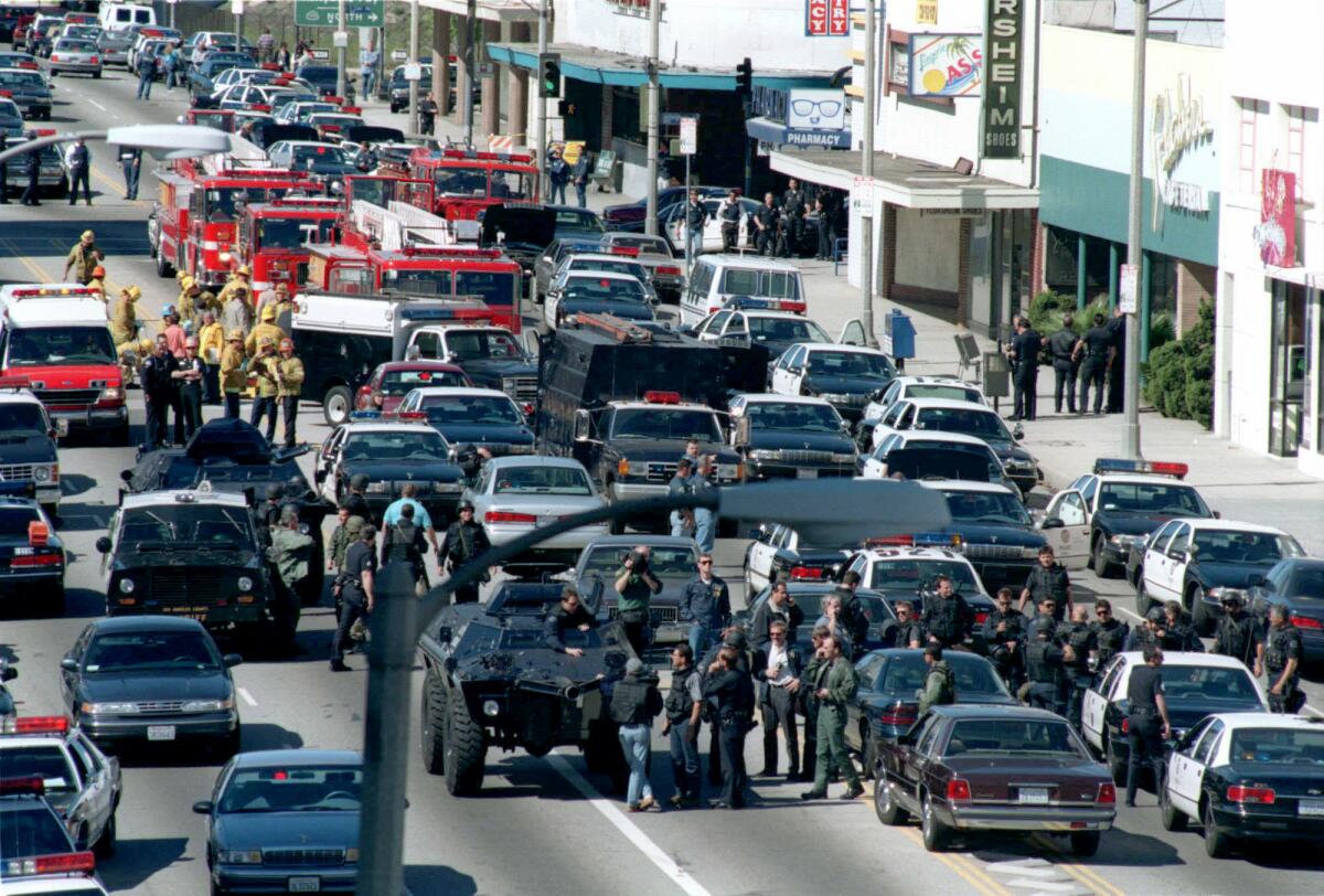 Police and fire vehicles at the scene of the shootout. (Frank Wiese / Los Angeles Times)