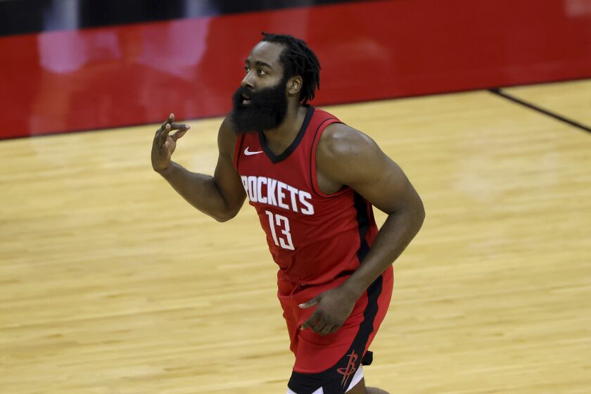 James Harden of the Houston Rockets reacts to a basket during the first quarter of an NBA basketball game Sunday, Jan. 10, 2021, in Houston, Texas. (Carmen Mandato/Pool Photo via AP)