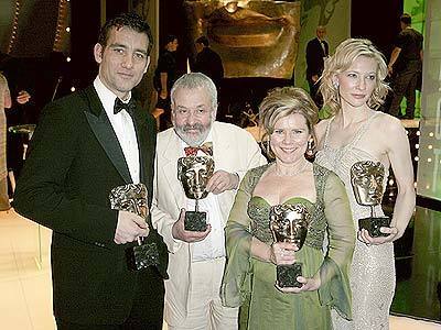 Actors Cate Blanchett (R), Imelda Staunton and Clive Owen (L) and director Mike Leigh pose with their awards for 'Best Supporting Actress', 'Best Actress', 'Best Supporting Actor' and 'Best Director' for their roles in The Aviator, Vera Drake, Closer and Vera Drake respectively at The Orange British Academy Film Awards 2005 at the Odeon Leicester Square in London.