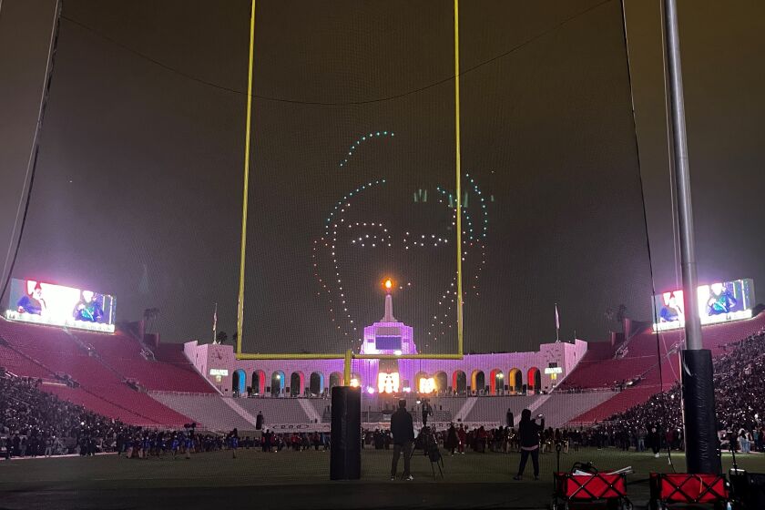 A drone show illuminates the Los Angeles Memorial Coliseum in October. 
