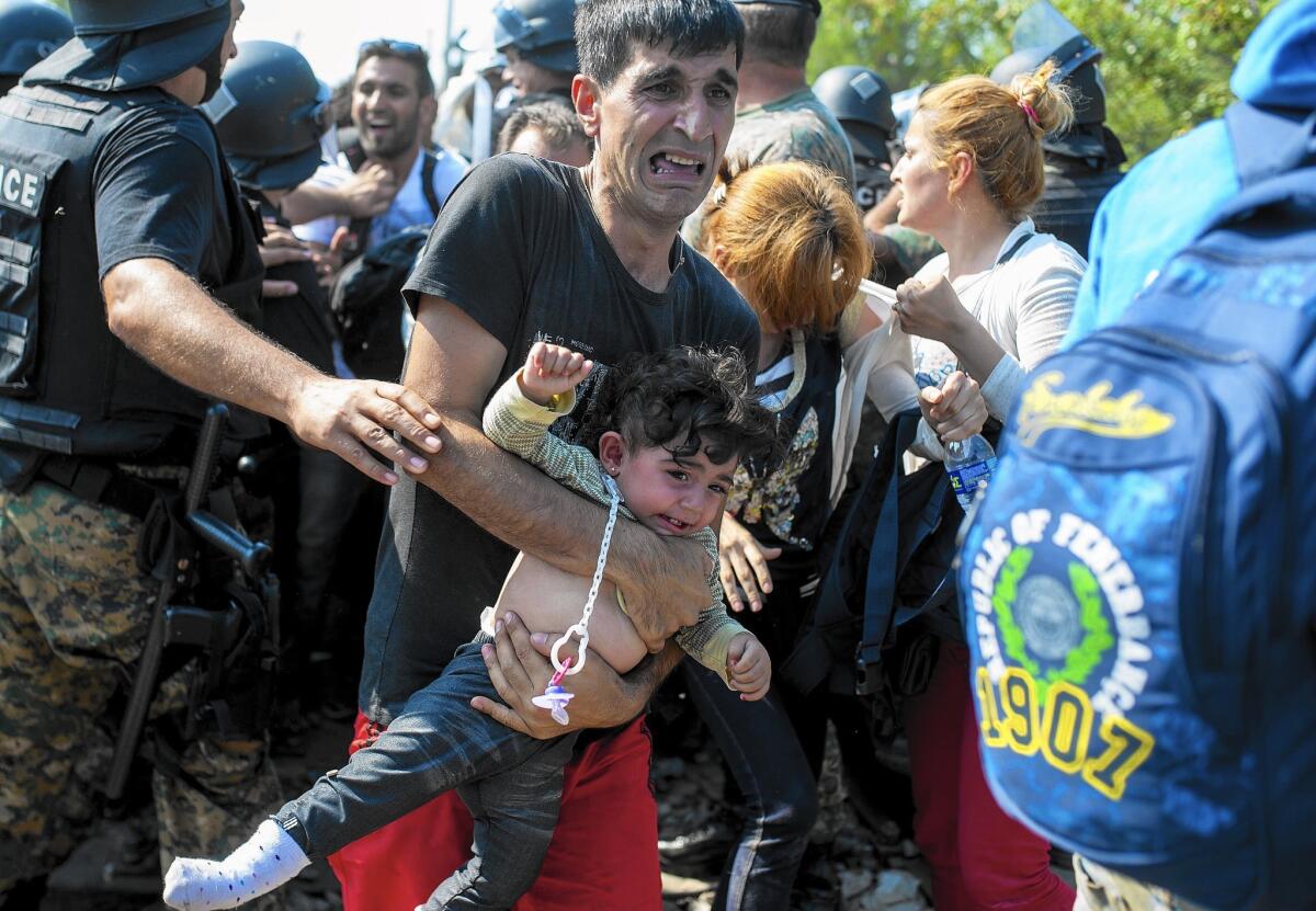 After recent clashes between police and migrants, authorities near Gevgelija, Macedonia, have given up trying to stop migrants from crossing the country en route to wealthy European Union countries.
