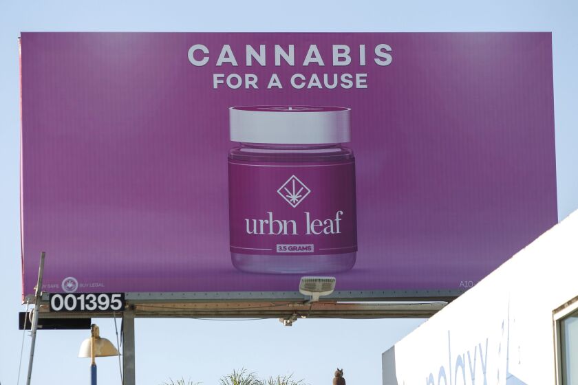 HAYNE PALMOUR IV  U-T A billboard on Morena Boulevard advertises the Urbn Leaf marijuana dispensary in San Diego.