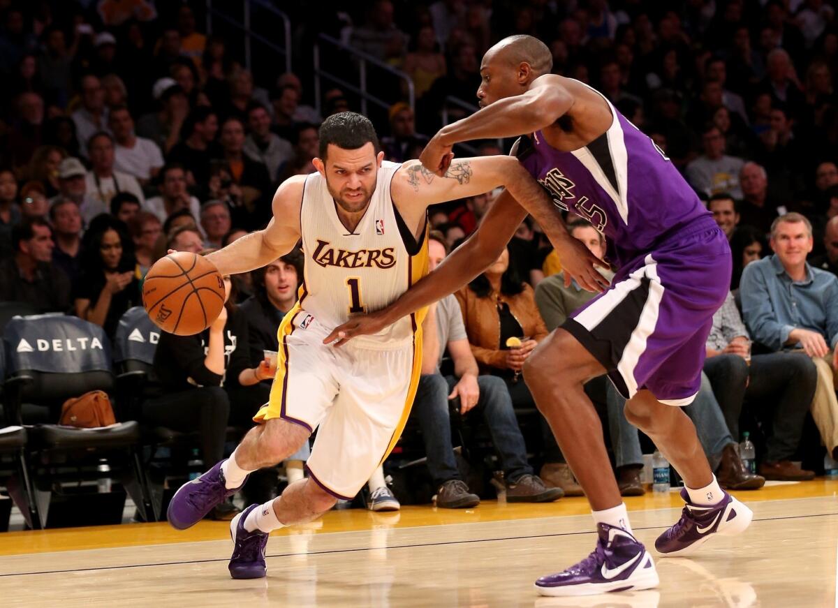 Lakers point guard Jordan Farmar, shown playing last week against the Sacramento Kings, is expected to be out approximately four weeks with a torn left hamstring.