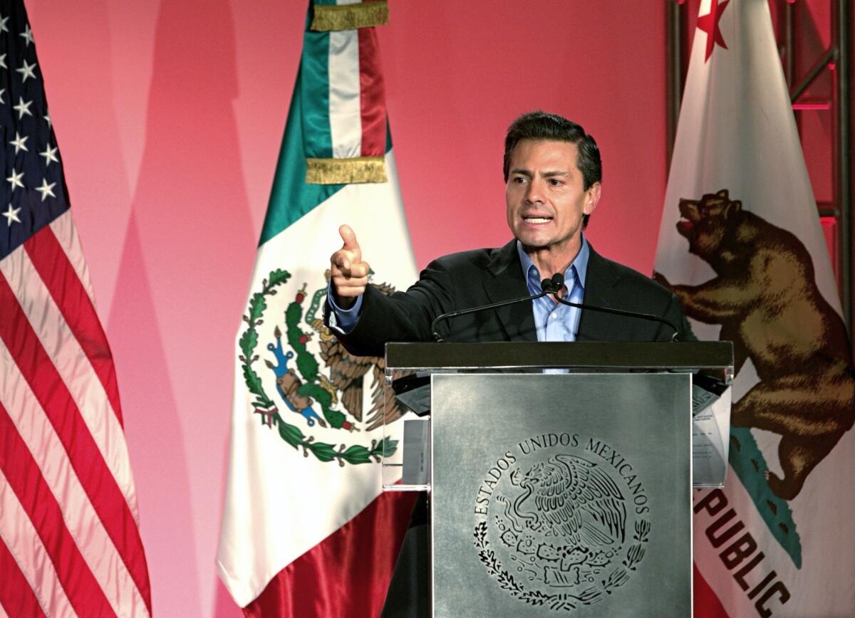 Mexican President Enrique Peña Nieto speaks in Los Angeles on Aug. 25.