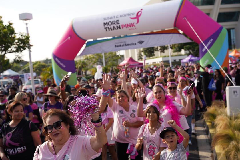 More than 8,000 walkers turned out for the Susan G. Komen “More than Pink” walk.