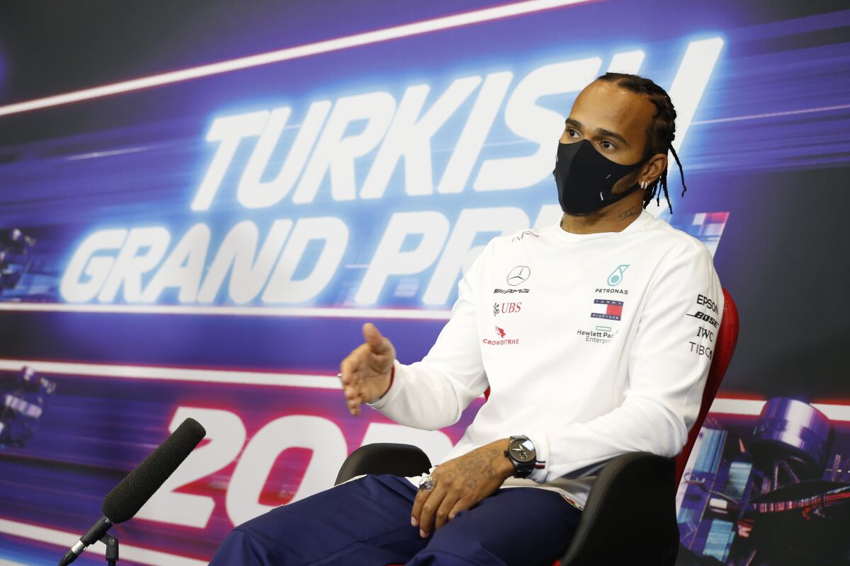 Mercedes driver Lewis Hamilton of Britain talks during a press conference at the Istanbul Park circuit racetrack in Istanbul, Thursday, Nov. 12, 2020, ahead of the Formula One Turkish Grand Prix that will take place on Sunday. (Antonin Vincent/Pool via AP)