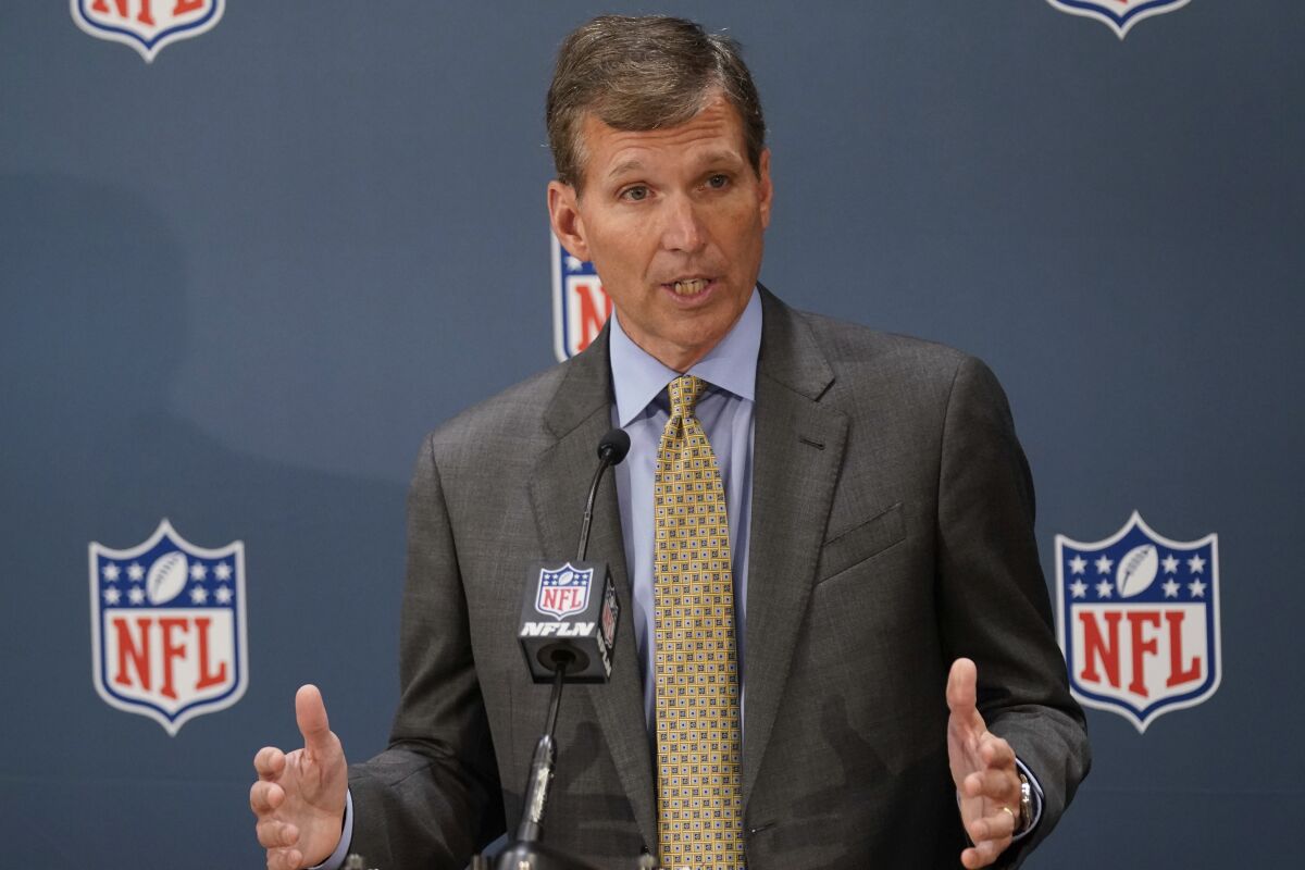Allen Sills, chief medical officer for the NFL, speaks at a news conference.