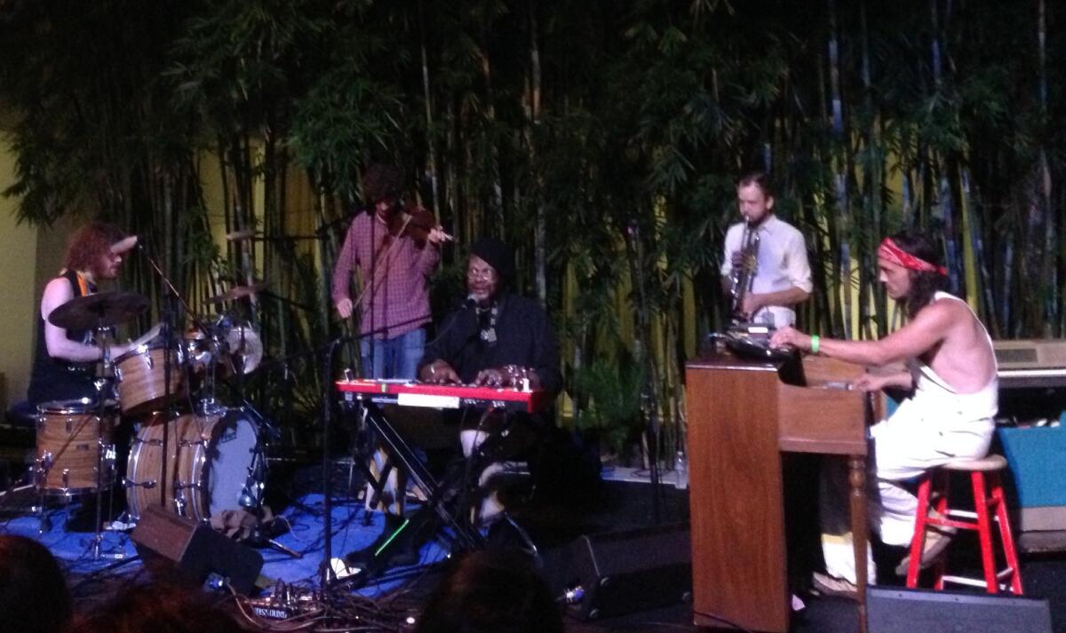 Artist and musician Lonnie Holley, center, and band perform as part of All the Instruments Agree at the Hammer Museum.