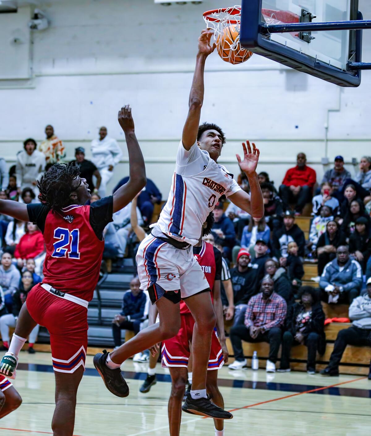 Alijah Arenas delivers a dunk for Chatsworth.